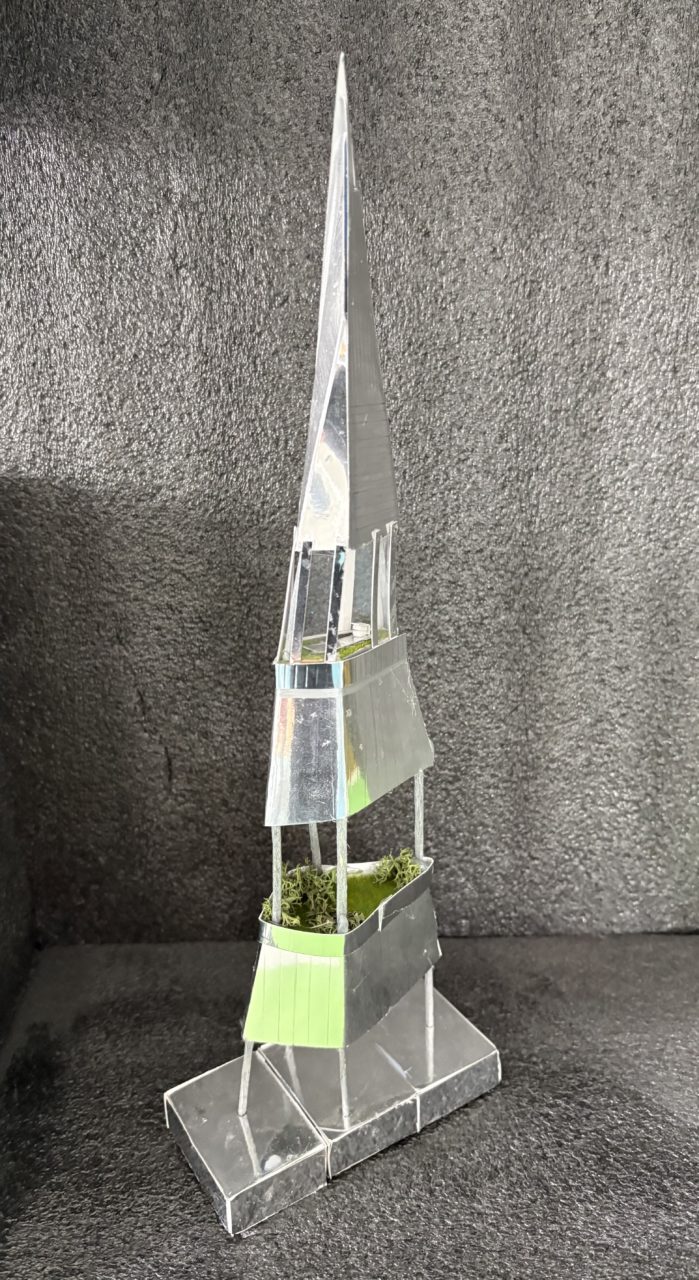 Year 6 pupils’ reimagined model of The Shard, constructed from mirrored silver card and divided into three sections. The Open sections reveal elevated green spaces and planted sky gardens, supported by columns. 